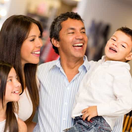 hispanic family happy after a dental emergency