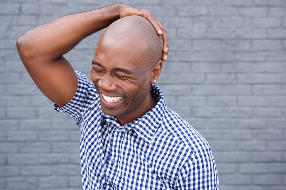 african american male smiling with dental restorations